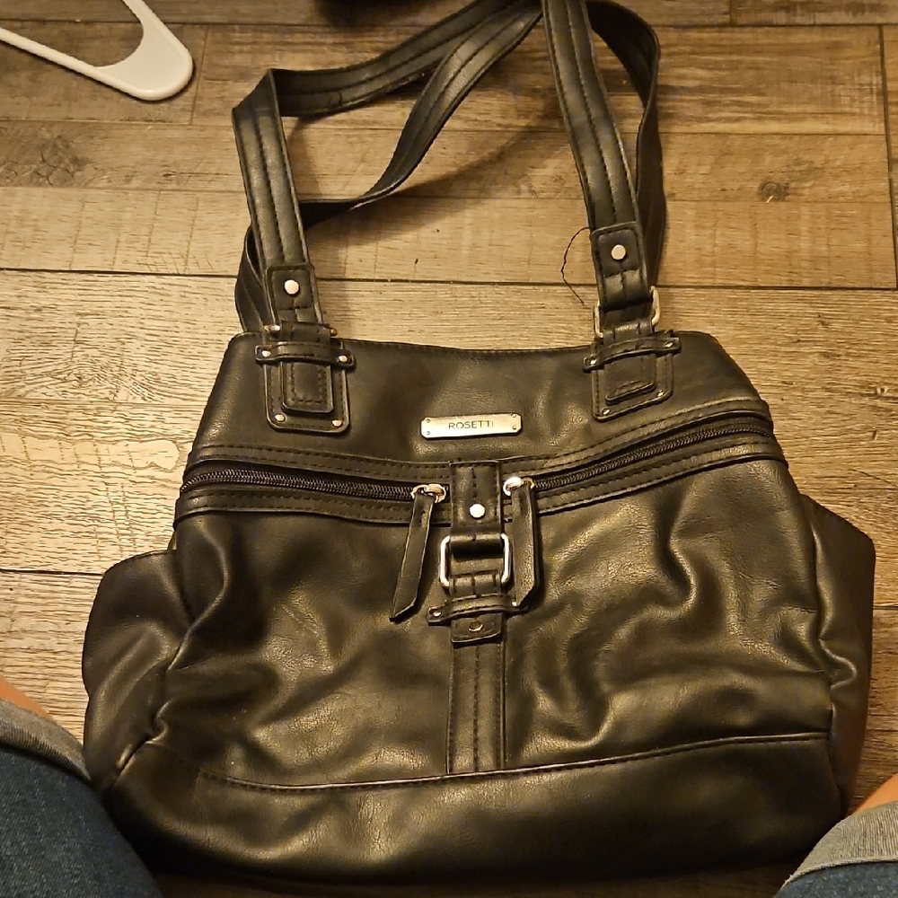 Rosetti Dark Leather Shoulder Bag with Buckle. Shows Signs of wear on handles